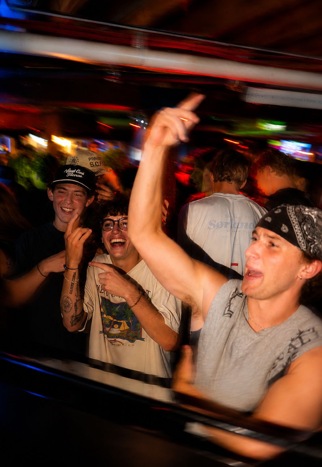 Group of friends cheering on the dance floor